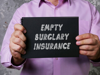 Financial concept about EMPTY BURGLARY INSURANCE with sign on the page.