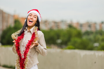 Sticker - christmas and new year lifestyle young latin woman. Hispanic celebrate holiday with santa hat.