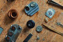 Vintage Watchmakers Tools On A Wooden Workbench