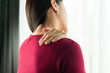 © PORNCHAI SODA - young women neck and shoulder pain injury, healthcare and medical concept