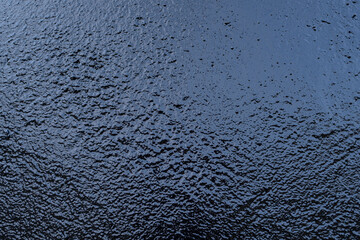 Texture of water repellent on concrete