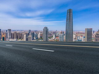 Empty asphalt road and city skyline and building landscape, China.