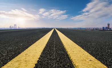 Empty asphalt road and city skyline and building landscape, China.