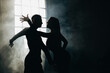 © Vadym - Couple of two professional ballroom dancers is dancing on loft studio. Beautiful art performance with heavy smoke. Sport life concept. Passion and emotional dance.
