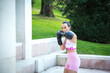 © luisrojasstock - portrait young caucasian female boxer with boxing gloves punching