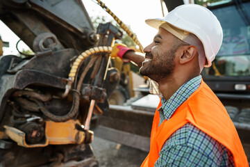 Wall Mural - Portrait of young construction engineer wearing hardhat