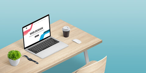 Wall Mural - Web design studio concept with laptop computer on desk in isometric position. Copy space beside