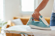 © bnenin - Picture of a shirt getting ironed.