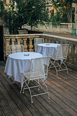 Poster - table and chairs in a garden