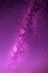 Wall Mural - vertical purple night sky milky way and star on dark background.universe filled with stars, nebula a