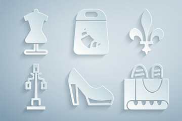 Sticker - Set Woman shoe, Fleur De Lys, Street light, French baguette bread, Croissant package and Mannequin icon. Vector