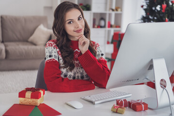 Wall Mural - Photo of happy charming young woman sit computer table christmas holiday mood indoors inside house home