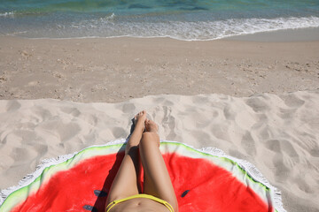 Sticker - Woman with beach towel on sand near sea, closeup