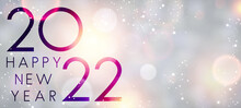 Fogged Glass 2022 Sign On Colorful Bokeh Background.