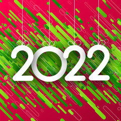 2022 sign over green strokes confetti.