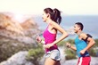 © BillionPhotos.com - Couple young friends strong sporty sportswoman sportsman training run