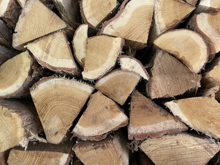 Poster - Closeup shot of dry chopped firewood logs in a pile