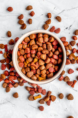 Wall Mural - dry dog food in bowl on white background top view