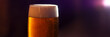 full glass of craft beer close up panorama