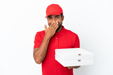 Canvas Print - pizza delivery man picking up pizza boxes isolated on white background happy and smiling covering mouth with hand