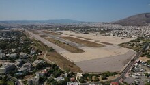 Aerial Drone Video Of Abandoned Runway And Control Tower In Former International Airport Of Greece In Elliniko Area, South Athens Riviera, Attica, Greece