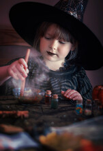 Little Witch Brewing Up A Potion, Halloween Concept