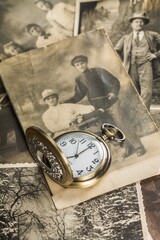 Wall Mural - Pocket Watch on Old Photos