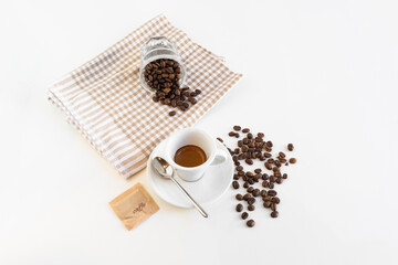 Poster - Cup of espresso for breakfast with roasted coffee beans