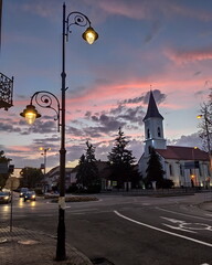 Sticker - BISTRITA ,Romania ,reformed church after sunset in October 2020