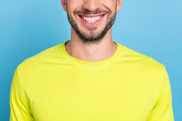 Cropped photo of young happy positive man good mood beaming smile dentist clinic isolated on blue color background