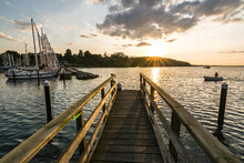 Wooden Pier And Scenic Marina At Sunset In Langballigau In Northern Germany