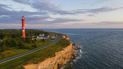 Poster - Coastal limestone cliff landscape with the lighthouse and wind turbines