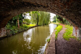 Fototapeta Do pokoju - Trent and Mersey canal with arch bridge in Cheshire UK