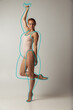 © master1305 - Portrait of young beautiful slim woman in lingerie isolated over gray background. Line art. Modern artwork
