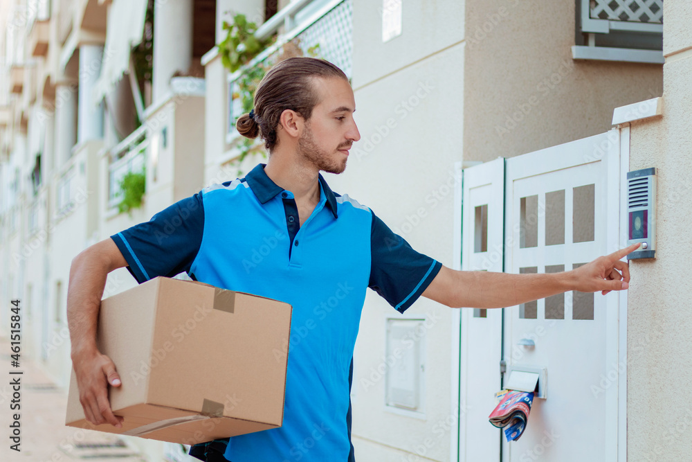 Mailman Ringing Delivery man ringing the house bell Stock Photo | Adobe Stock