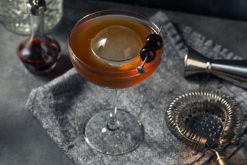 Canvas Print - Boozy Cold Manhattan Cocktail with a Big Ice Cube