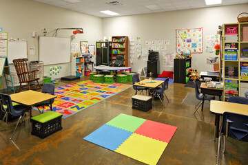 Interior of modern colorful preschool classroom