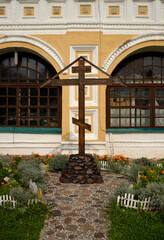 Wall Mural - Cross on south side of Resurrection Cathedral of 17th century on right bank of Volga river in summer in Tutayev, Yaroslavl region, Russia