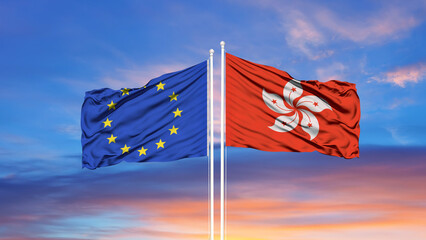 Wall Mural - European Union and Hong Kong two flags on flagpoles and blue cloudy sky