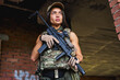 © Roman - Woman British special forces soldier with weapon take part in military maneuver. war, army, technology and people concept. Lady In military Gear In Abandoned Building Alone, In Position, Look At Side