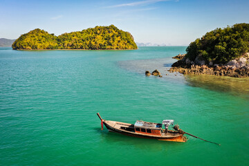 Poster - Fishing boat on the calm sea in Mu Koh Chang National Park, Ko, Thailand