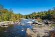 Penobscot River surrounded by early fall foliage in Baxter State Park Maine
