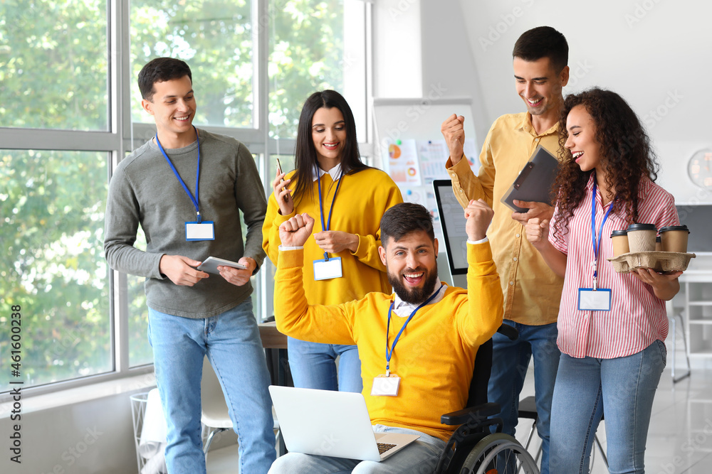 Happy business colleagues working in office