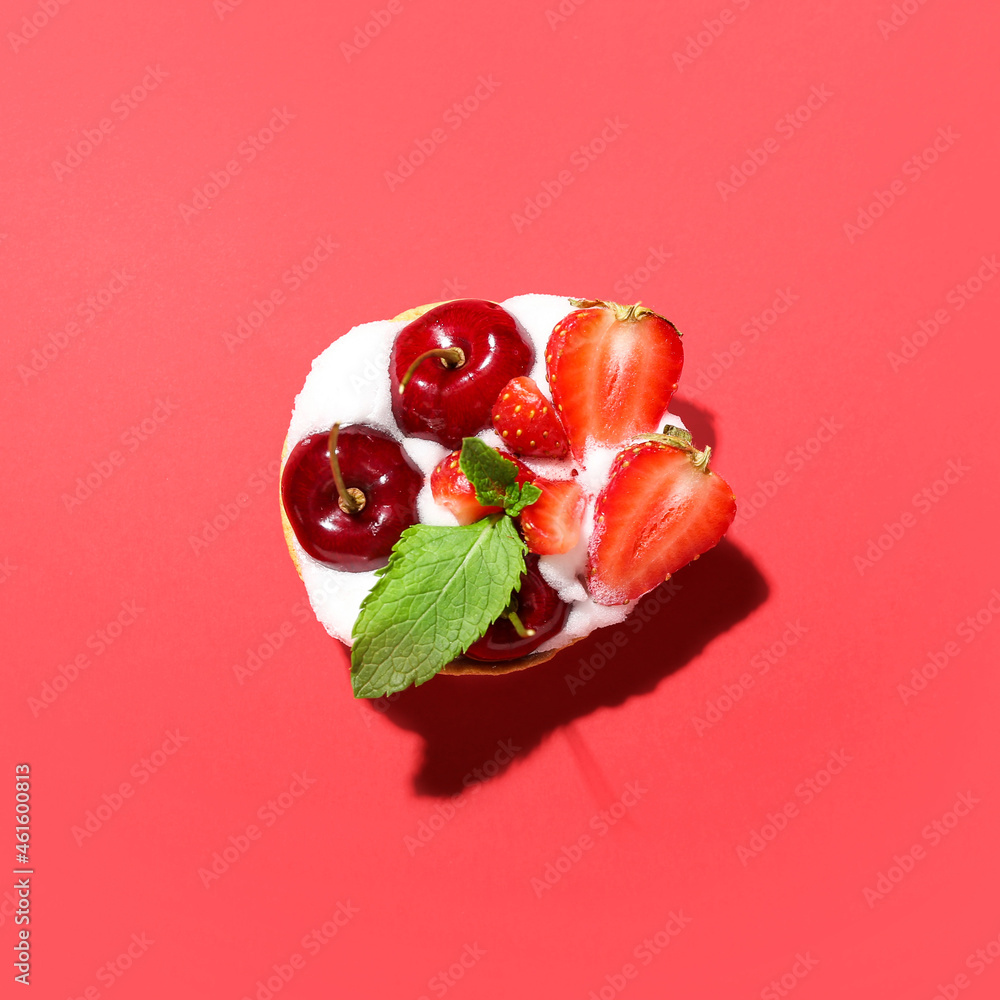 Tasty berry tart on color background