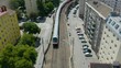 Fixed Aerial Shot of Subway Train in Vienna, Austria, Europe. Pan Down Tracking Shot