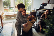 © Jacob Lund - Family opening Christmas gifts together