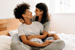 © (JLco) Julia Amaral - Romantic lesbian couple at home