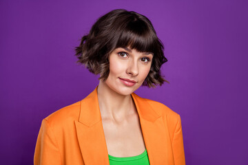 Poster - Photo of funny charming young woman dressed orange blazer smiling isolated purple color background