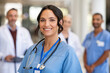 © Rido - Portrait of friendly nurse smiling at hospital