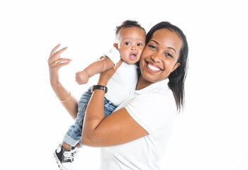 portrait of beautiful african woman holding on hands her little son on white background